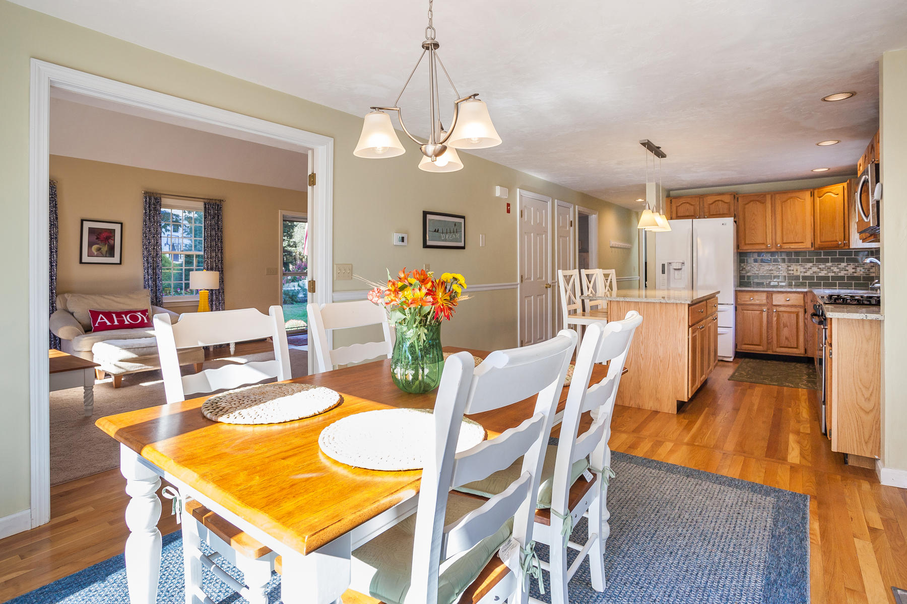 97 Shields Road Mashpee, MA 02649 - Photo 10 of 31 a view of a dining room with furniture and wooden floor