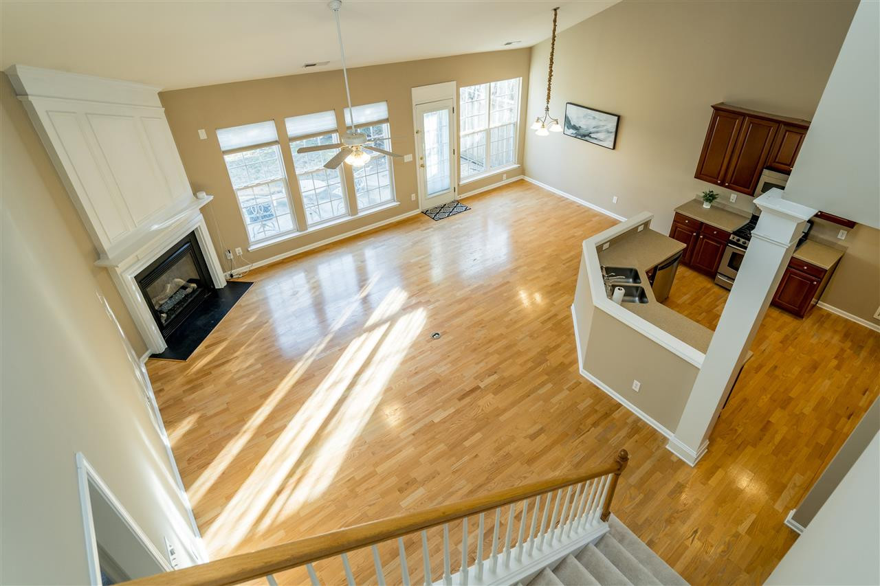 5405 Brandy Bay Road Raleigh, NC 27613 - Photo 23 of 23 View from the stairs of this open floorplan with lots of natural light! Living Room