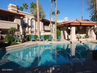 10410 North Cave Creek Road, Unit 2043 Phoenix, AZ 85020 - Photo 14 of 22 a view of street with sitting area