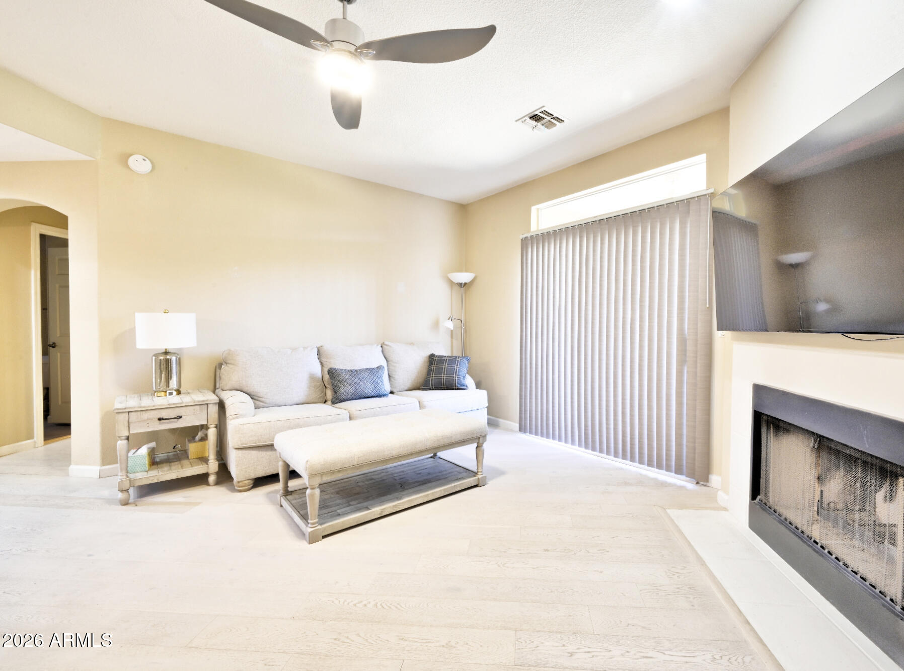 10410 North Cave Creek Road, Unit 2043 Phoenix, AZ 85020 - Photo 22 of 22 a spacious bedroom with bed and a fireplace