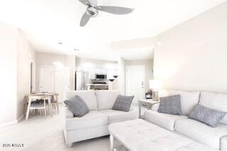 10410 North Cave Creek Road, Unit 2043 Phoenix, AZ 85020 - Photo 6 of 22 a living room with furniture and a large window