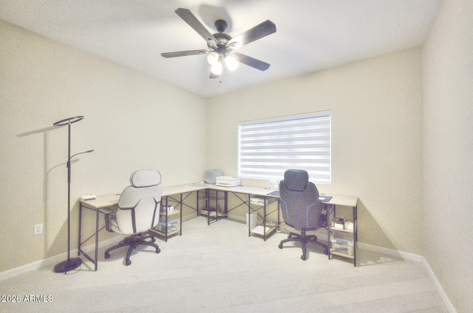 10410 North Cave Creek Road, Unit 2043 Phoenix, AZ 85020 - Photo 10 of 22 a living room with chairs and a table
