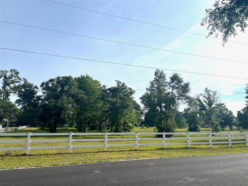 0 Northeast 56th Street High Springs, FL 32643 - Photo 22 of 23 a view of a swimming pool with a yard