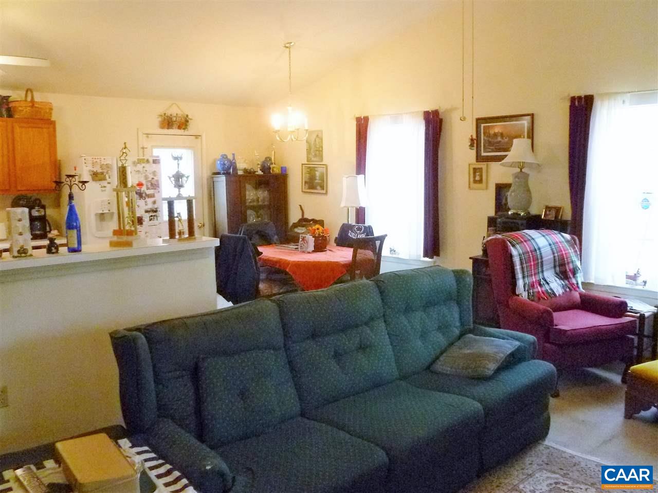25 Poppy Road Ruckersville, VA 22968 - Photo 2 of 32 a living room with furniture and large windows