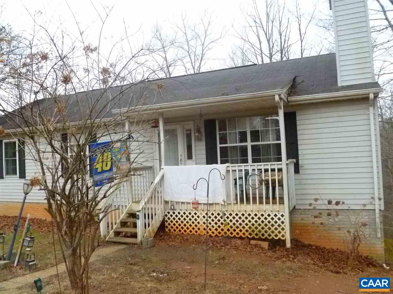 25 Poppy Road Ruckersville, VA 22968 - Photo 27 of 32 a view of a brick house with a large window