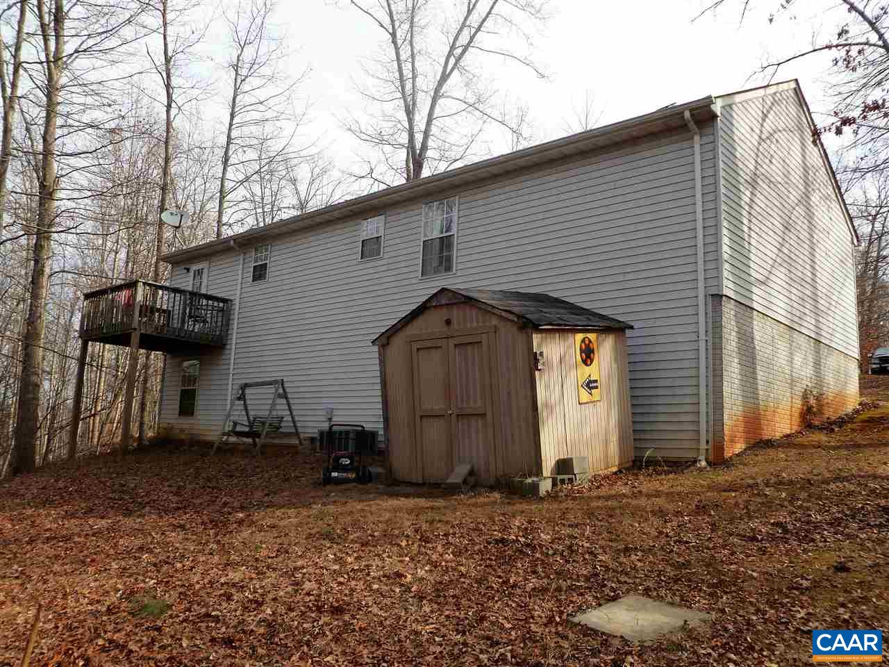 25 Poppy Road Ruckersville, VA 22968 - Photo 28 of 32 a view of a house with backyard and chair