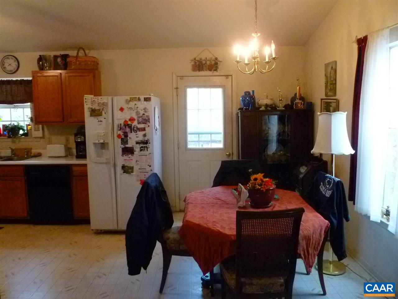 25 Poppy Road Ruckersville, VA 22968 - Photo 6 of 32 a living room with furniture a desk and a fireplace