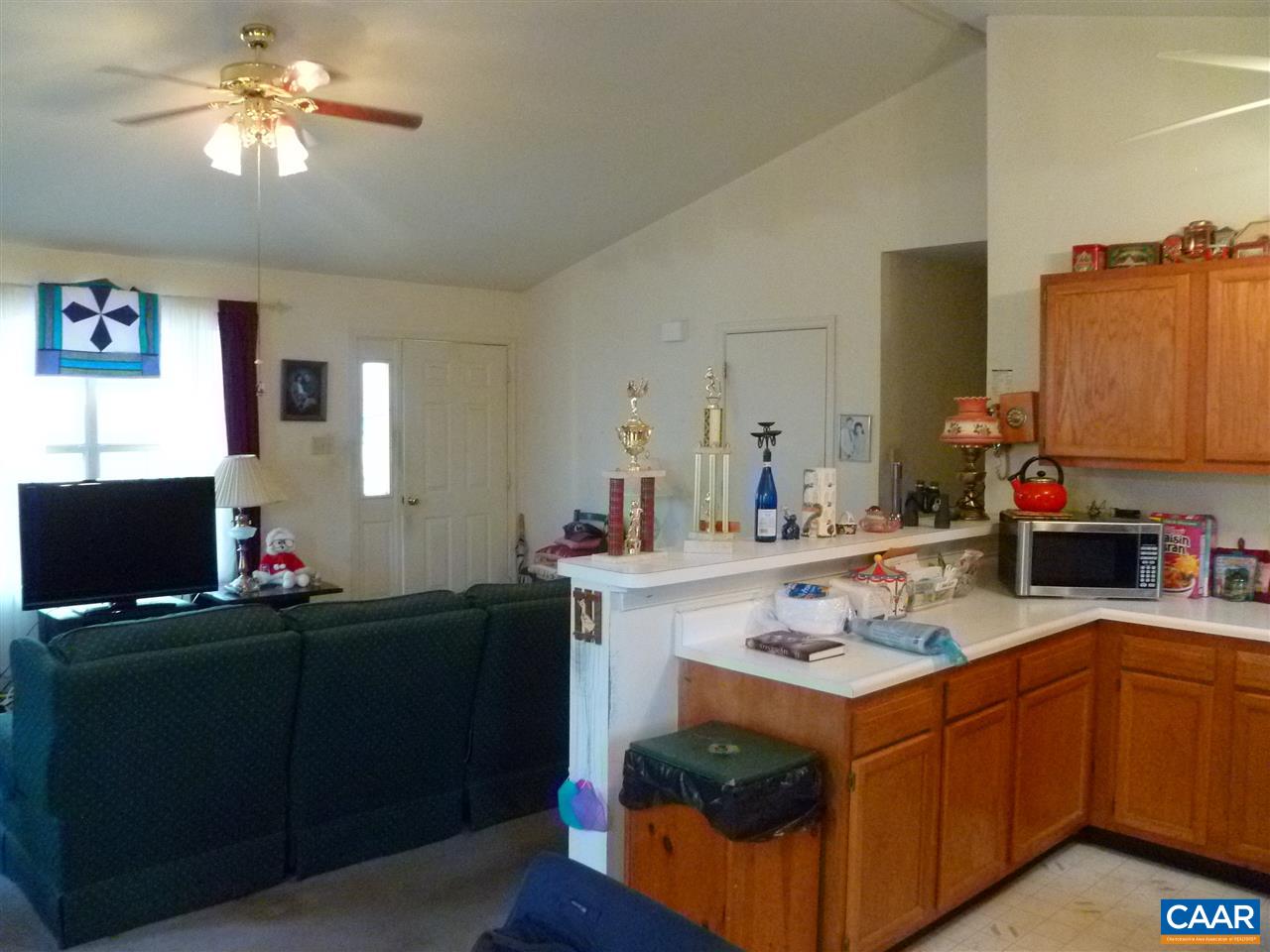 25 Poppy Road Ruckersville, VA 22968 - Photo 9 of 32 a kitchen with a sink stove and microwave