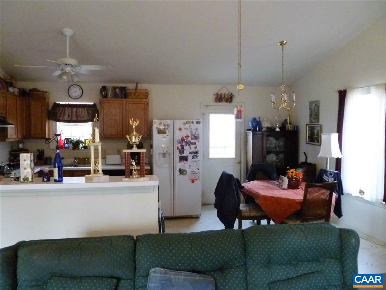25 Poppy Road Ruckersville, VA 22968 - Photo 10 of 32 a living room with furniture and a flat screen tv