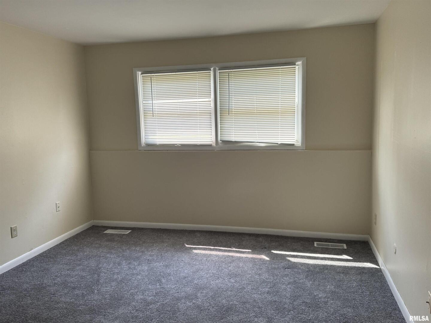 1907 16th Street Silvis, IL 61282 - Photo 8 of 10 a view of room with window