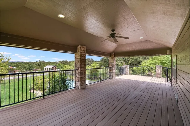 a view of a deck with wooden floor yard and outdoor space