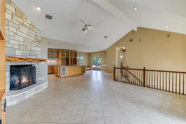 a view of a livingroom with furniture and a fireplace