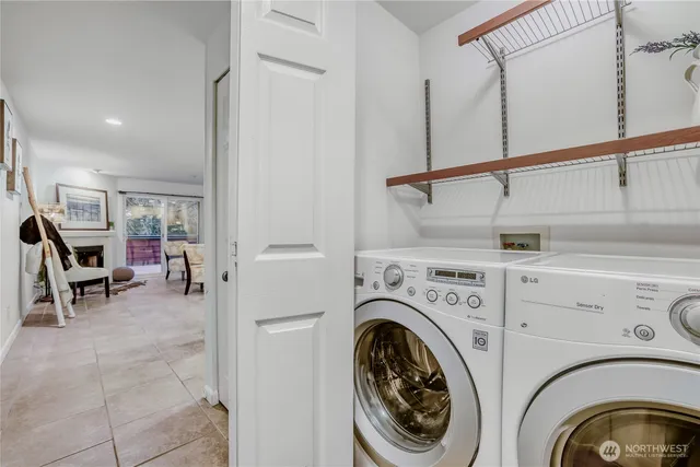 a view of livingroom with washer and dryer