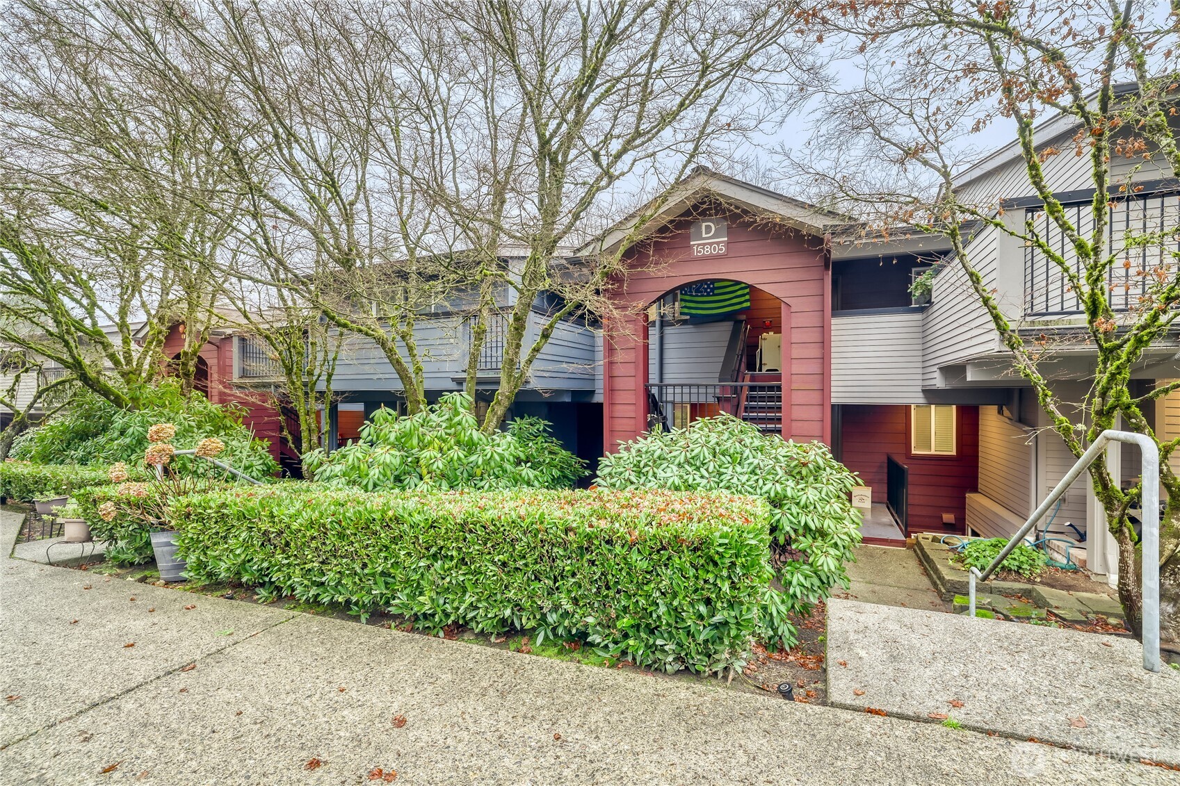 15805 Waynita Way Northeast, Unit D107 Bothell, WA 98011 - Photo 2 of 18 front view of a house with a small yard