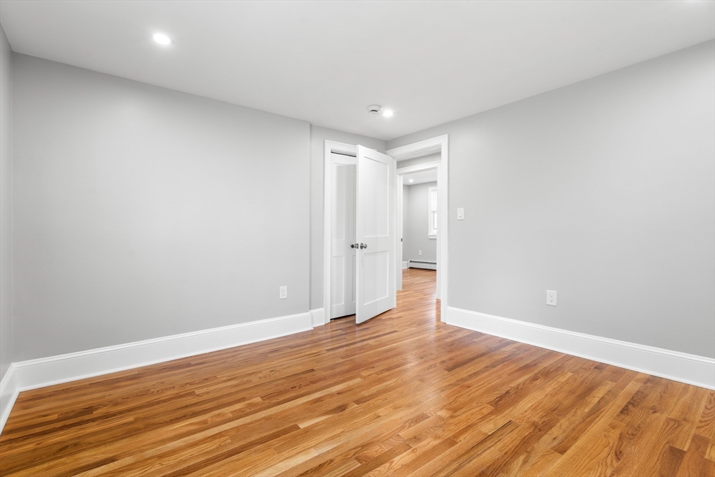 212 Cambridge Road Woburn, MA 01801 - Photo 16 of 25 a view of an empty room