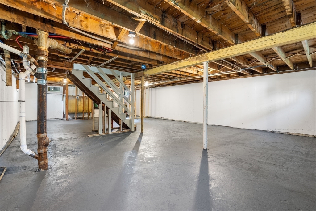 212 Cambridge Road Woburn, MA 01801 - Photo 21 of 25 a view of an indoor garage