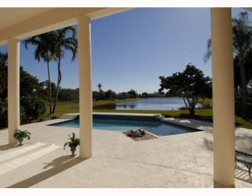 a view of swimming pool and lounge chair