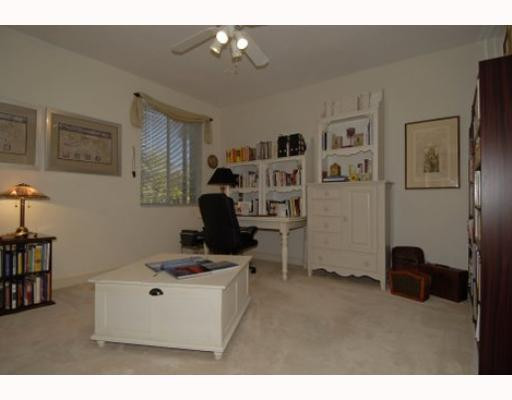 2855 Paddock Road Weston, FL 33331 - Photo 13 of 16 a view of a workspace with furniture and a window