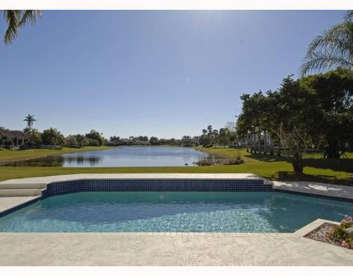 2855 Paddock Road Weston, FL 33331 - Photo 9 of 16 a view of swimming pool with a lake view