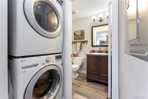 a view of a hallway with washer and dryer