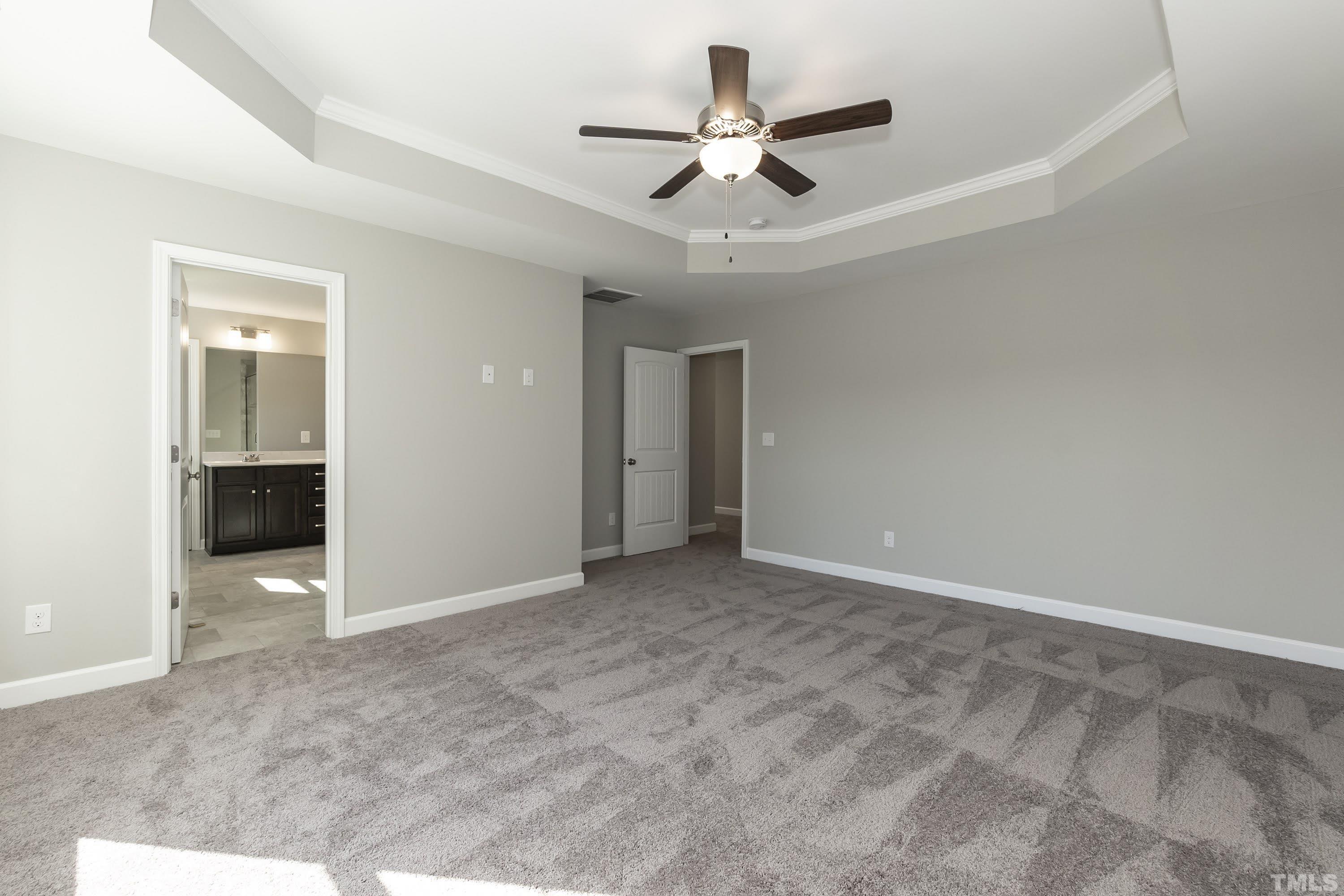6002 East Pool Road Rougemont, NC 27572 - Photo 14 of 23 a view of an empty room with a ceiling fan