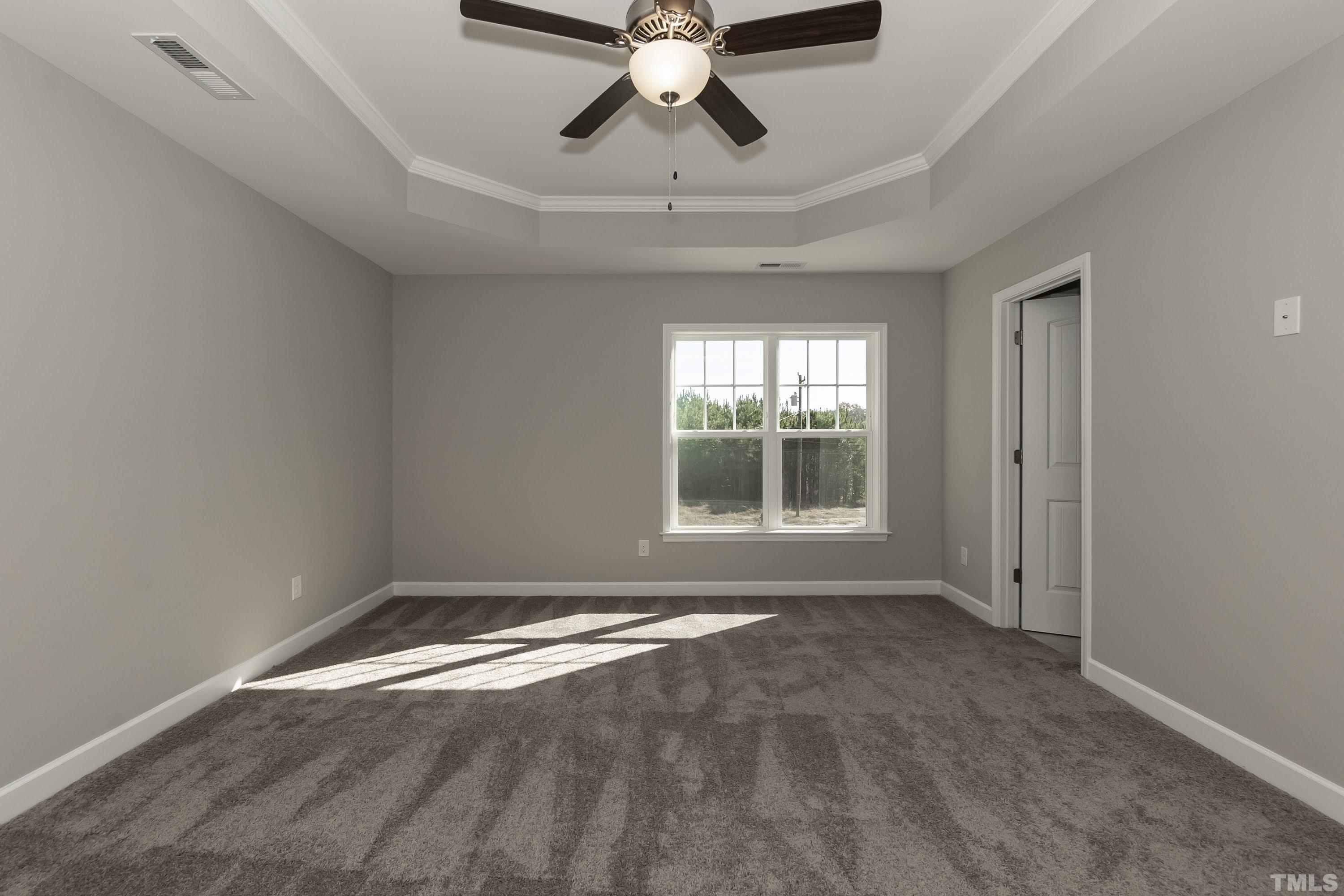 6002 East Pool Road Rougemont, NC 27572 - Photo 16 of 23 a view of room with window and ceiling fan
