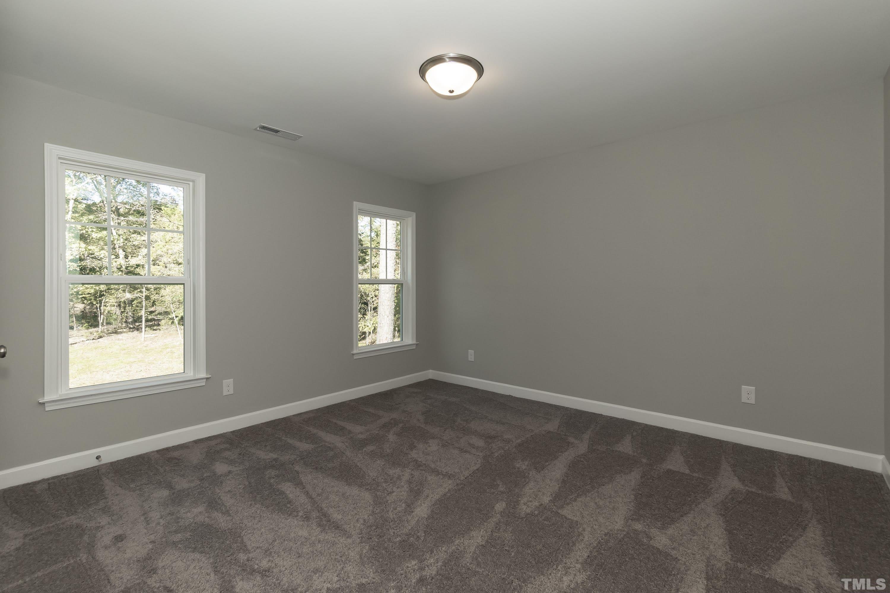 6002 East Pool Road Rougemont, NC 27572 - Photo 20 of 23 an empty room with a window