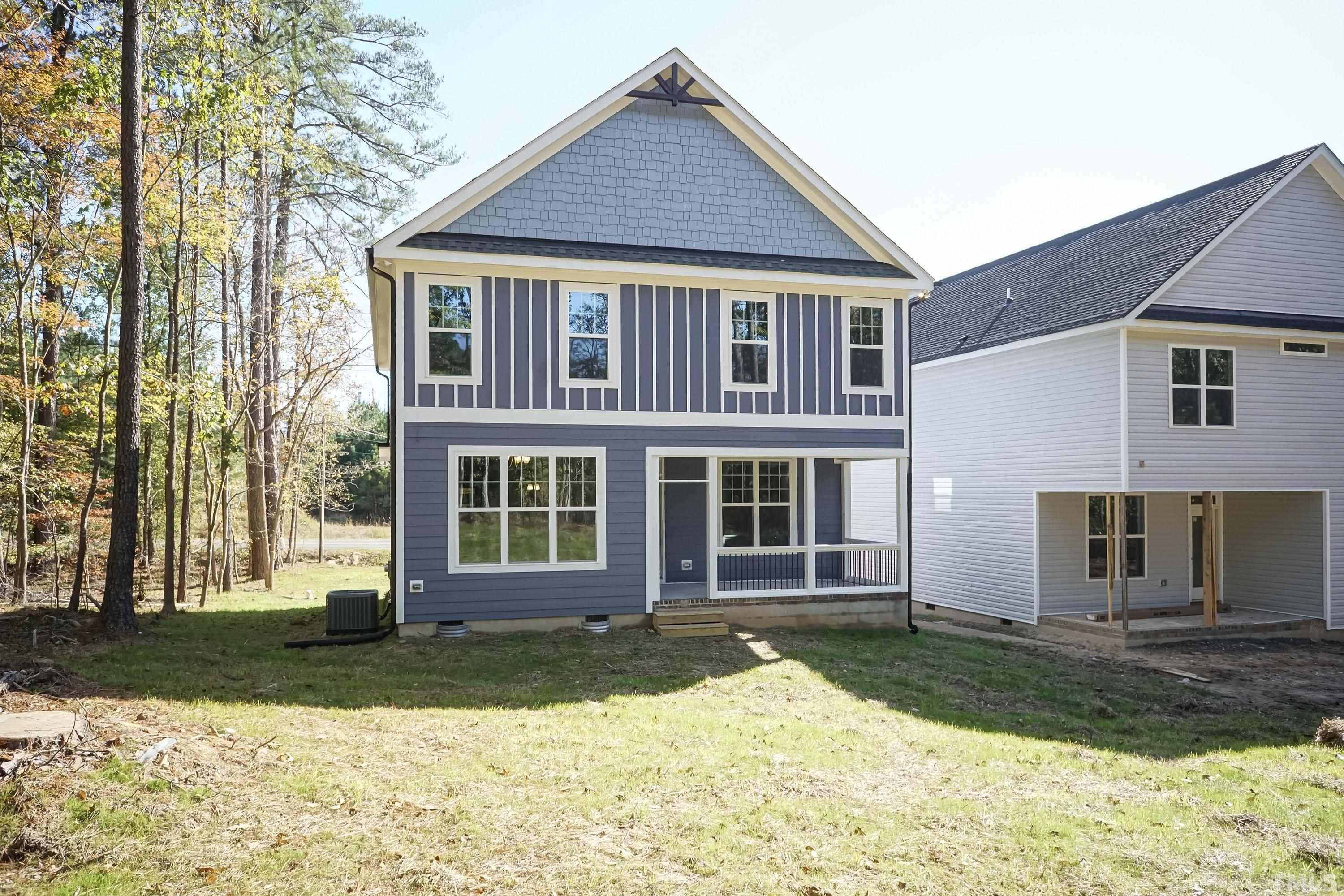 6002 East Pool Road Rougemont, NC 27572 - Photo 23 of 23 a front view of a house with a yard