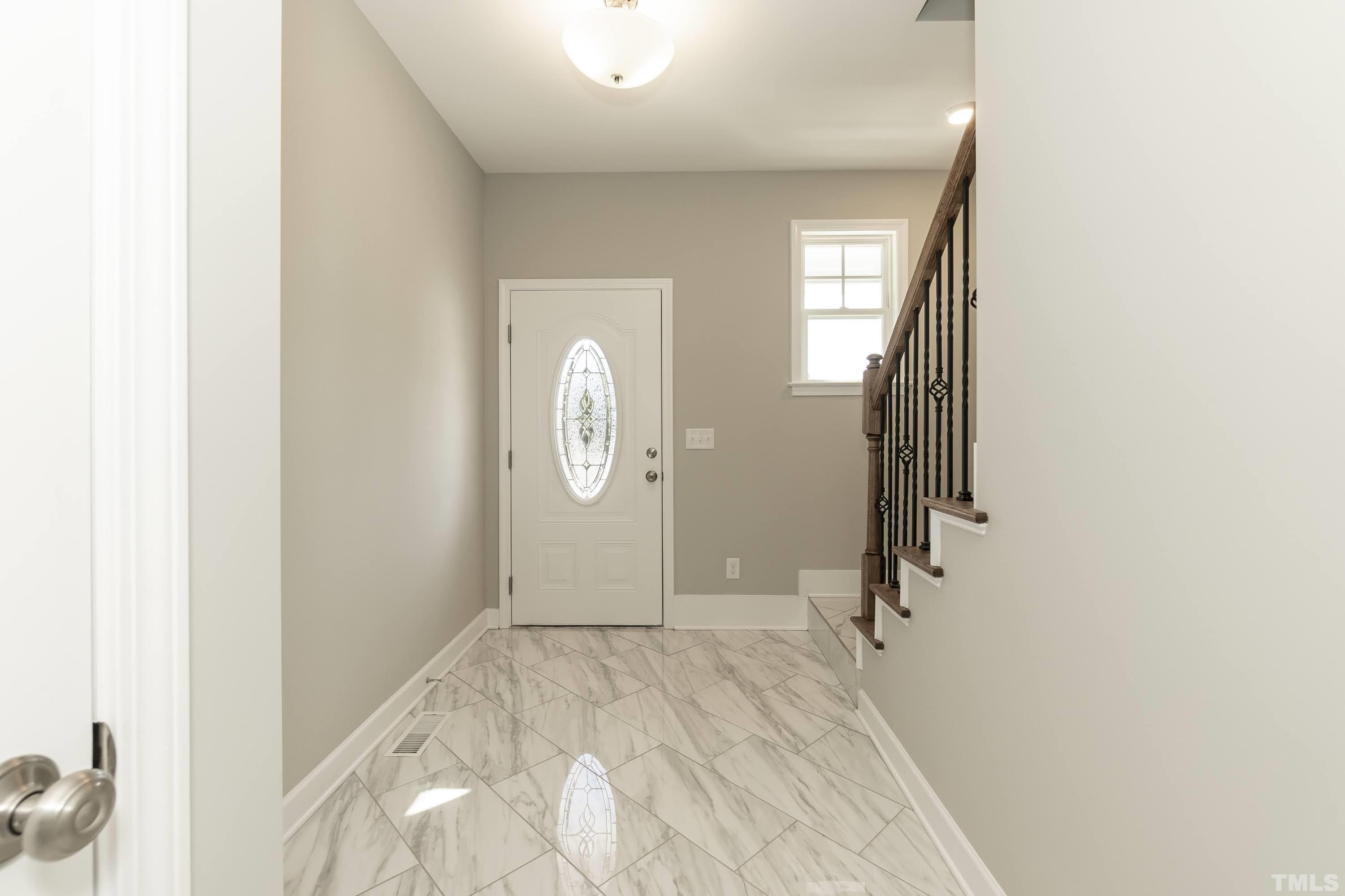 6002 East Pool Road Rougemont, NC 27572 - Photo 4 of 23 a view of a room with wooden floor and bathroom