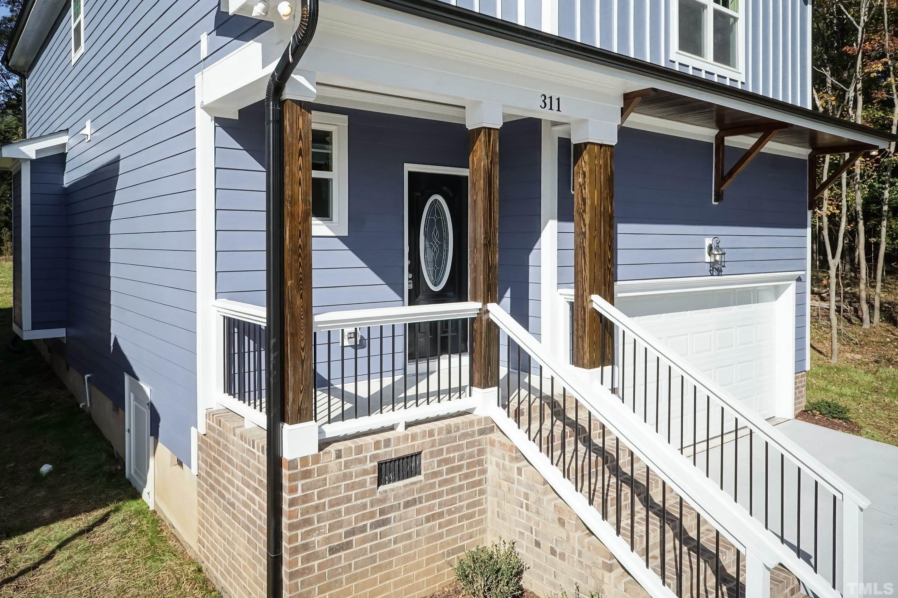 6002 East Pool Road Rougemont, NC 27572 - Photo 5 of 23 a view of front door and porch