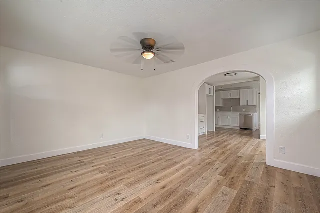 a view of kitchen and wooden floor