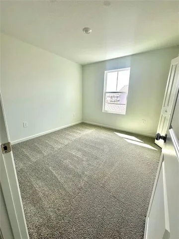 a view of a room with a window