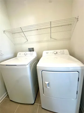 a view of a kitchen with an empty space and sink