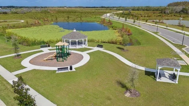 a view of a swimming pool with an ocean view