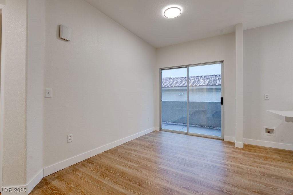 1881 West Alexander Road, Unit 1129 North Las Vegas, NV 89032 - Photo 15 of 31 Dining room with light wood finished floors and baseboards