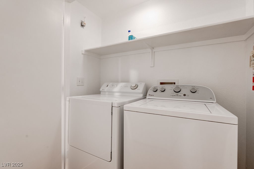 1881 West Alexander Road, Unit 1129 North Las Vegas, NV 89032 - Photo 27 of 31 Laundry area featuring separate washer and dryer