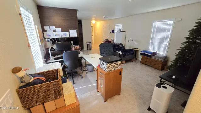 a living room with furniture and a window