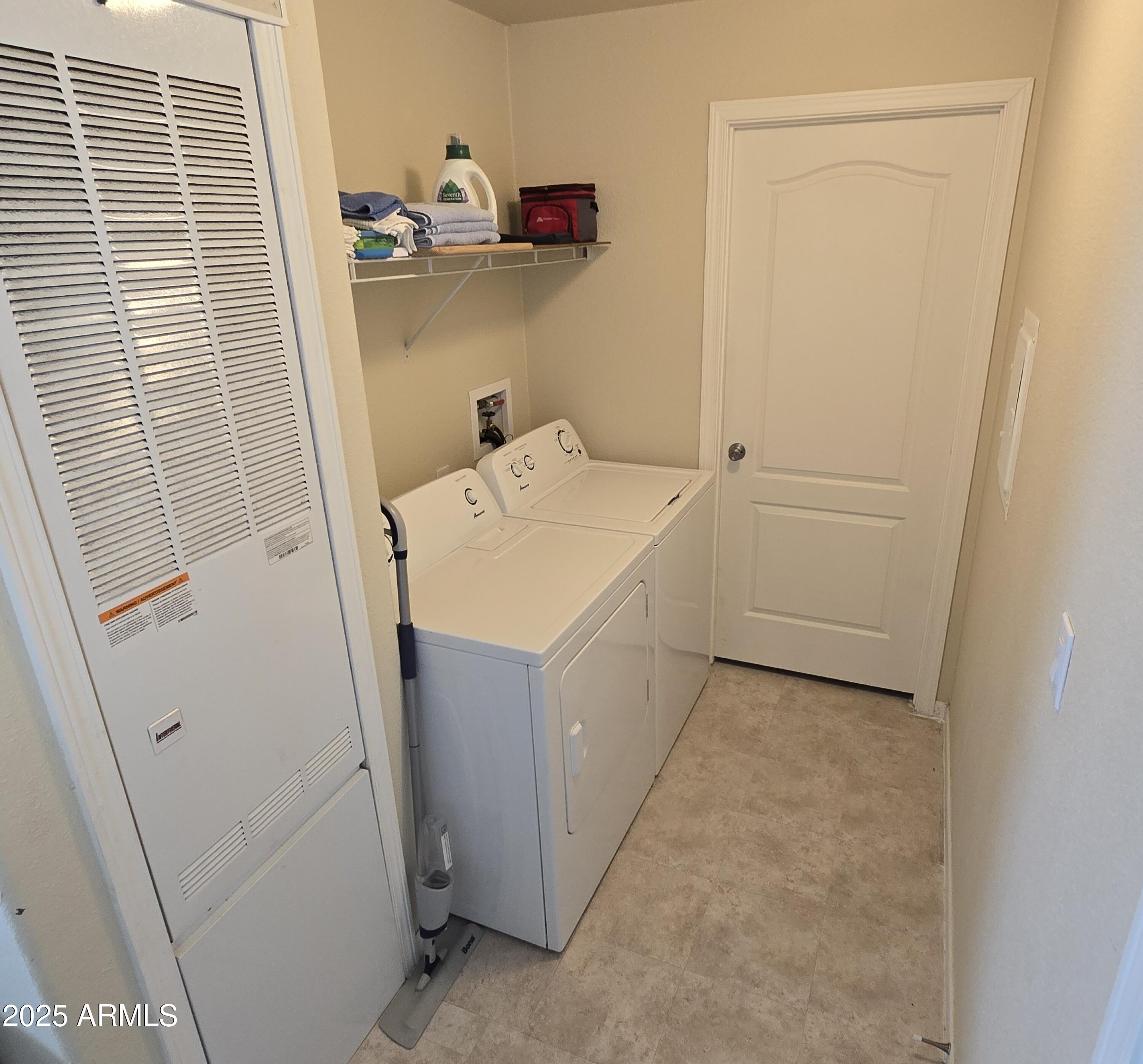 10540 East Apache Trail, Unit 182 Apache Junction, AZ 85120 - Photo 19 of 30 a utility room with a sink a washer and dryer