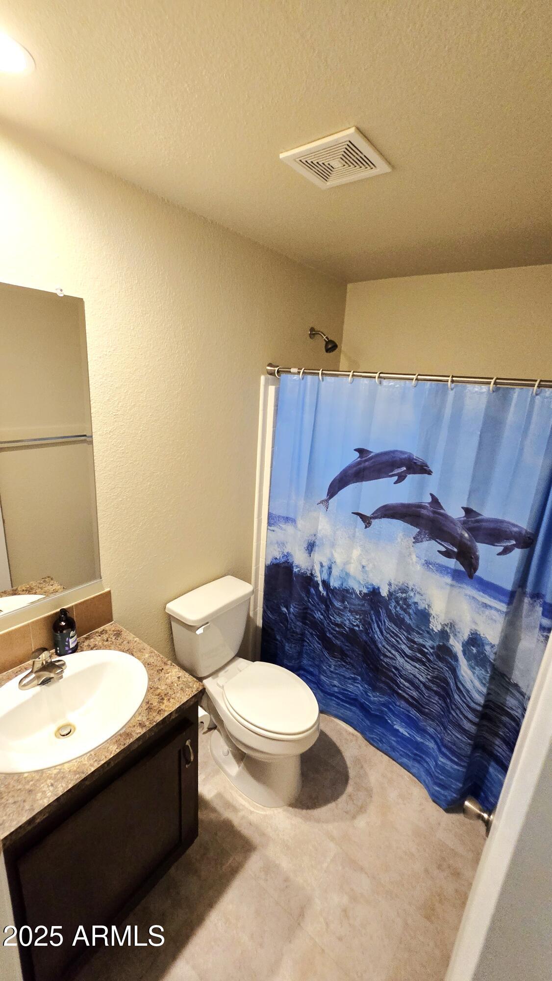 10540 East Apache Trail, Unit 182 Apache Junction, AZ 85120 - Photo 24 of 30 a bathroom with a sink and a toilet