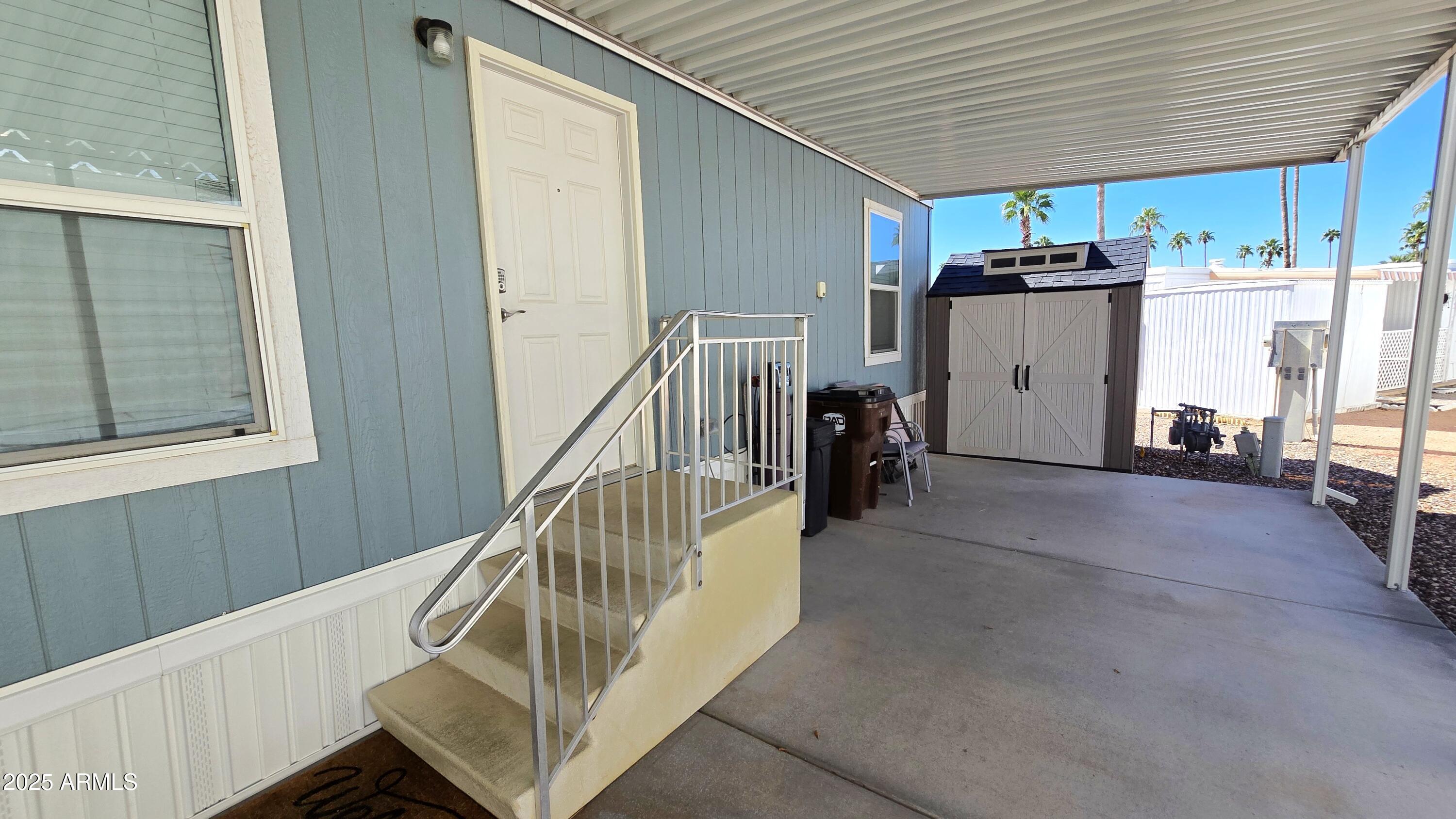 10540 East Apache Trail, Unit 182 Apache Junction, AZ 85120 - Photo 6 of 30 a view of a livingroom with stairs and furniture
