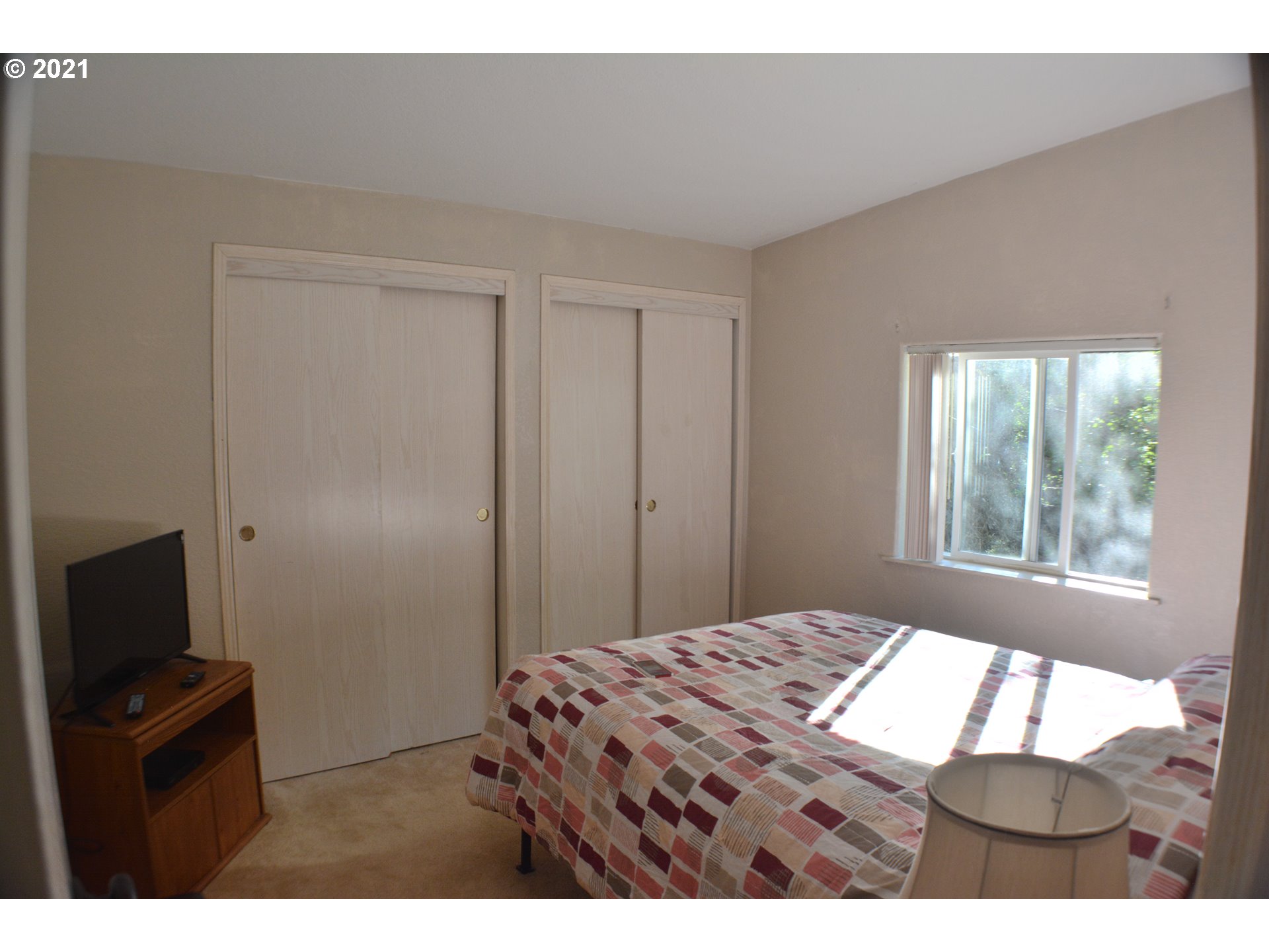 57915 Highway 203 Union, OR 97883 - Photo 12 of 27 a bedroom with a bed and a tv