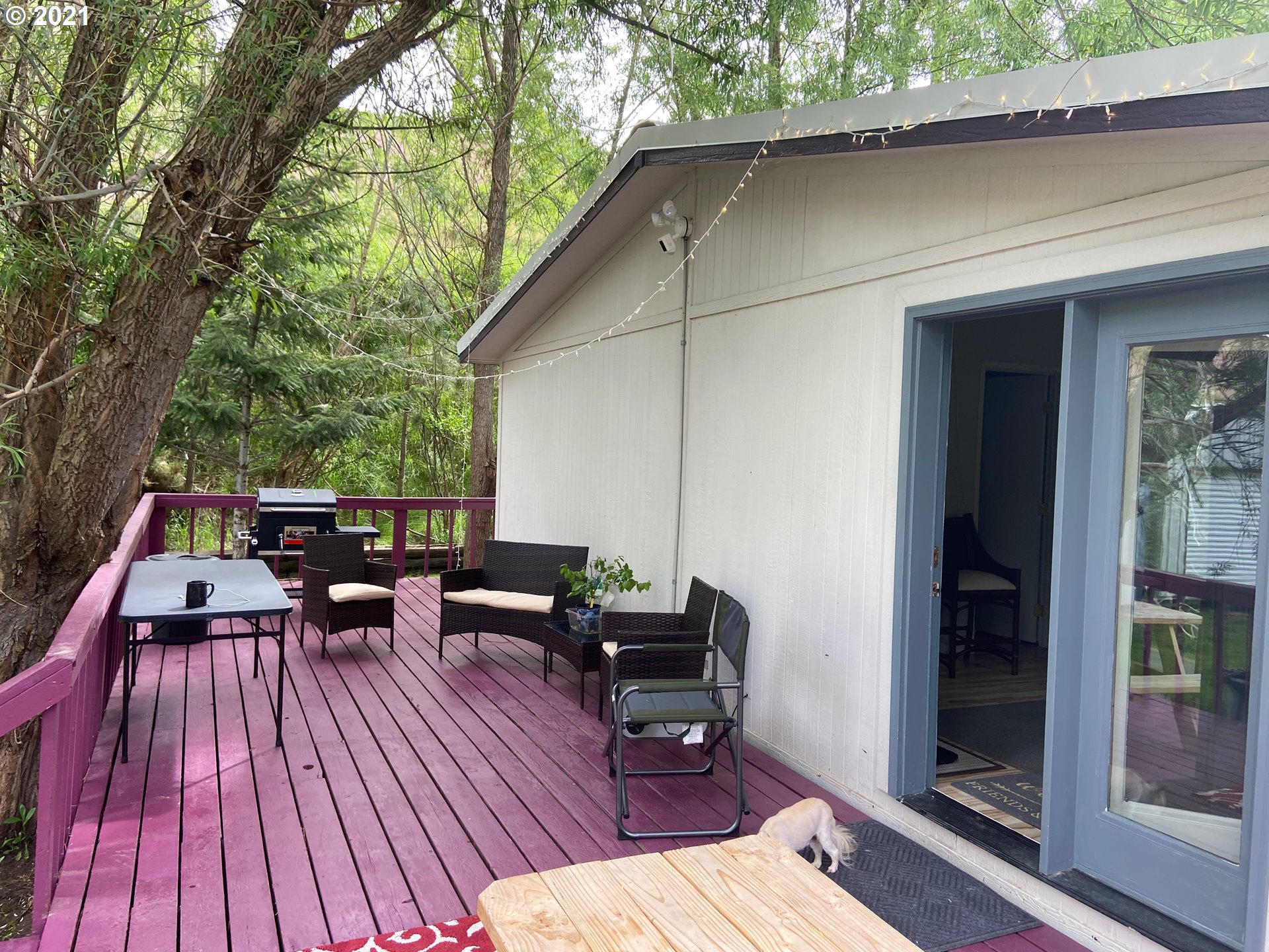 57915 Highway 203 Union, OR 97883 - Photo 2 of 27 a view of deck with table and chairs and wooden floor