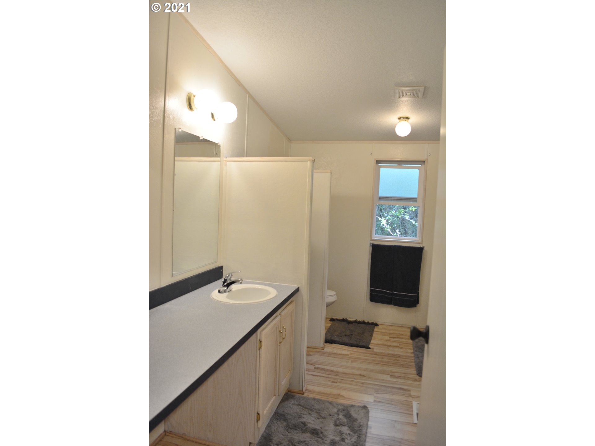 57915 Highway 203 Union, OR 97883 - Photo 10 of 27 a bathroom with a sink and a mirror