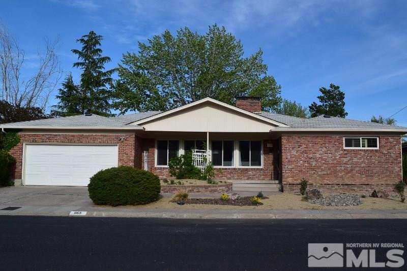 1165 Dennison Drive Reno, NV 89509 - Photo 1 of 1 a front view of a house with a yard