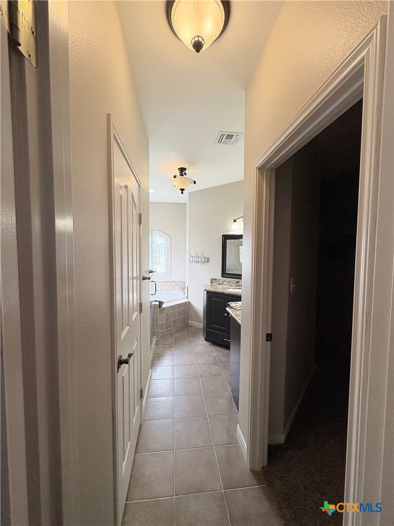 949 Abrameit Road Goliad, TX 77963 - Photo 31 of 48 a view of a hallway with a living room