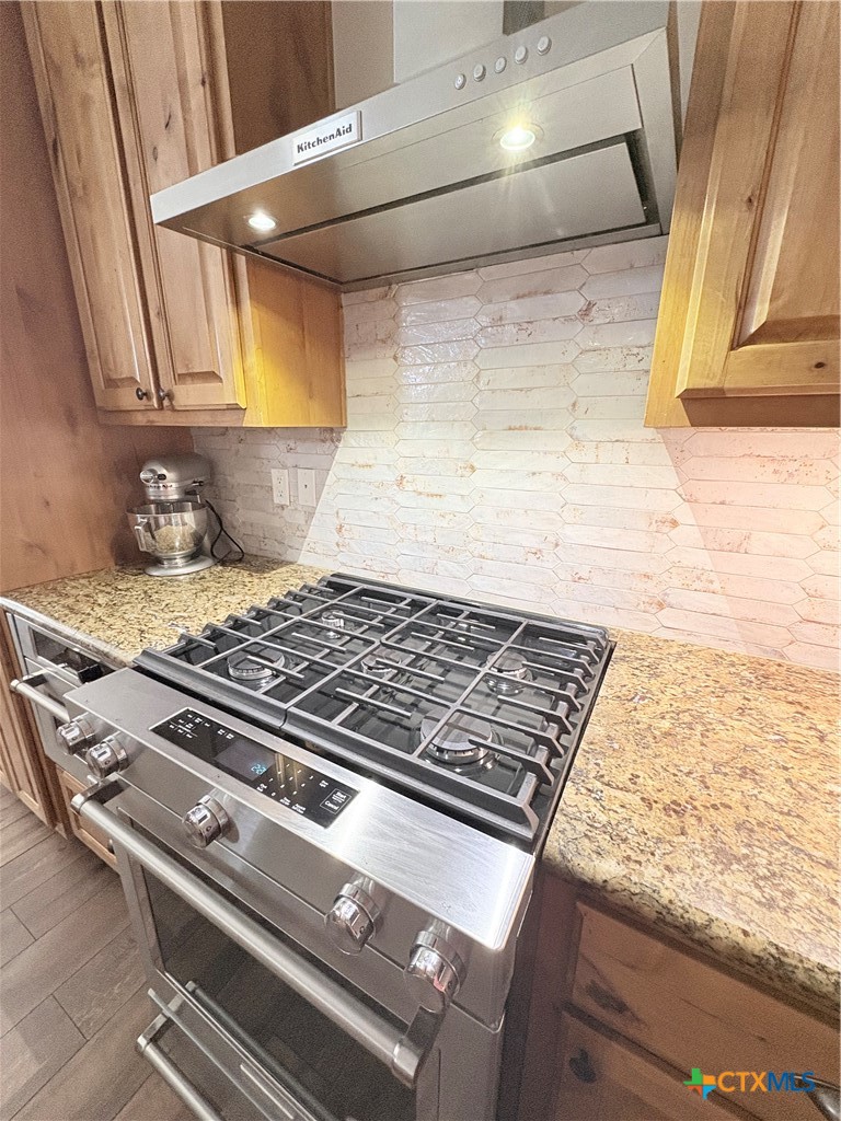 949 Abrameit Road Goliad, TX 77963 - Photo 41 of 48 a stove top oven sitting inside of a kitchen