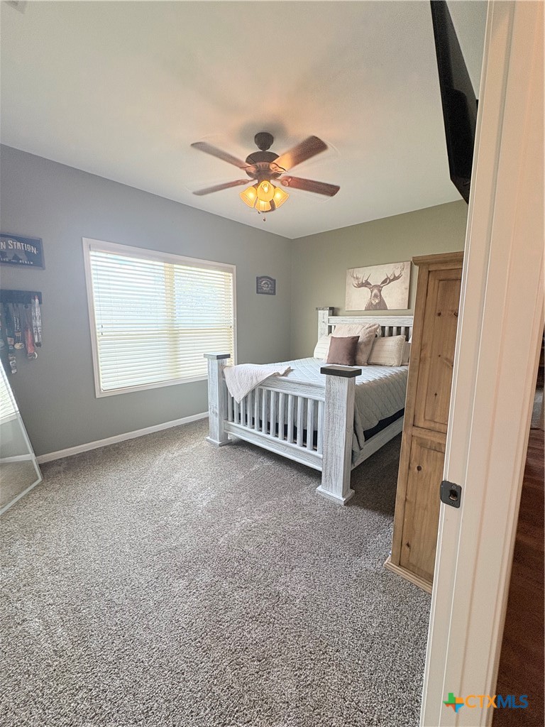 949 Abrameit Road Goliad, TX 77963 - Photo 48 of 48 a living room with a bed furniture and a window