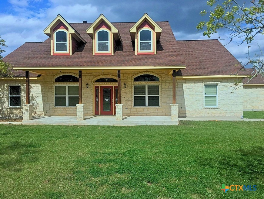 949 Abrameit Road Goliad, TX 77963 - Photo 6 of 30 a front view of a house with a yard
