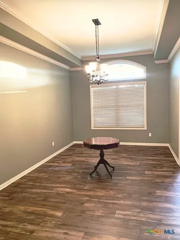 a view of a room and window