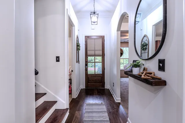 a living room with a couch and a window